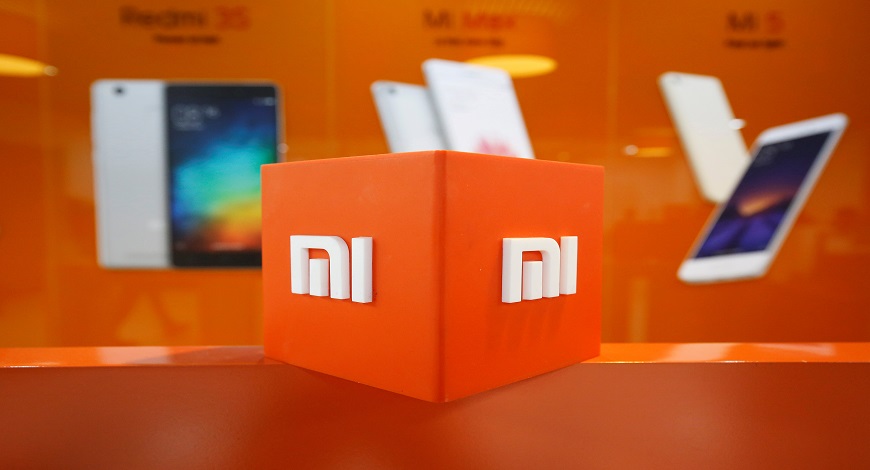 FILE PHOTO: The logo of Xiaomi is seen inside the company's office in Bengaluru, January 18, 2018. REUTERS/Abhishek N. Chinnappa/File Photo